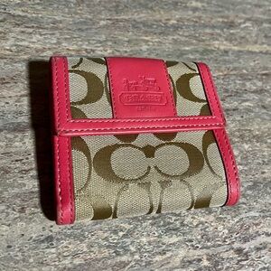 Coach Pink and Tan Signature Wallet with many compartments